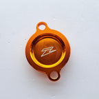 Zeta - Oil Filter Cover - KTM SXF 250 13-26, SXF350 11-26, SXF450 09-12 & 16-26, EXCF250 14-26, EXCF350 12-26, EXCF450/500 17-26, Husqvarna FC250/350 14-26, FC450 16-26, FE250/350 14-26, FE450/501 17-26, Gas Gas MCF/ECF/EXF 250-500 21-26 - Orange