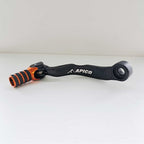 Apico Elite Gear Lever - KTM SX85 18-27, SX125/150 17-22, EXC150 17-23, XC-W125/150 17-22, Husqvarna TC85 18-27, TC125 17-22, TE150 17-23, TX125 17-23, Gas Gas MC85 21-27, MC125 21-23 (Black/Orange)