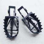 DRC - Foot Pegs (Ultra-Wide) - KTM SX85 18-24, SX125/150 16-22, SX250 17-22, SXF250-450 16-22, EXC/EXCF250-500 17-23, Husqvarna TC85 18-24 TC125 16-22, TC250 17-22, FC250-450 16-22, TE/FE 150-501 17-23, Gas Gas MC/MCF/EC/ECF/EX/EXF 85-450 21-23