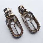 Apico - Foot Pegs - Titanium - BRACED - KTM SX/SXF 125-450 23-27, EXC/EXCF 125-450 24-27, Husqvarna TC/FC 125-450 23-27, TE/FE 125-450 24-27, TX300 23-27, FX350/450 23-27, Gas Gas 125-500 24-27, MCF250/450 FACTORY 23-27