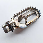 Apico - Foot Pegs - Titanium - BRACED - KTM SX/SXF 125-450 23-27, EXC/EXCF 125-450 24-27, Husqvarna TC/FC 125-450 23-27, TE/FE 125-450 24-27, TX300 23-27, FX350/450 23-27, Gas Gas 125-500 24-27, MCF250/450 FACTORY 23-27