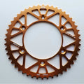 JT - Sprocket - Rear - JTA897/224U/TR130 - 520 - KTM 125-530 90-27, Husqvarna 125-501 14-27, Gas Gas 125-450 21-27, Triumph 250/450 24-27, STARK - Orange