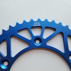 JT - Sprocket - Rear - JTA897/224U/TR130 - 520 - KTM 125-530 90-27, Husqvarna 125-501 14-27, Gas Gas 125-450 21-27, Triumph 250/450 24-27, STARK - Blue