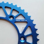 JT - Sprocket - Rear - JTA897/224U/TR130 - 520 - KTM 125-530 90-27, Husqvarna 125-501 14-27, Gas Gas 125-450 21-27, Triumph 250/450 24-27, STARK - Blue