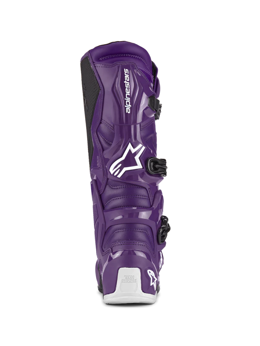 Purple motocross boot with Alpinestars logo on a white background