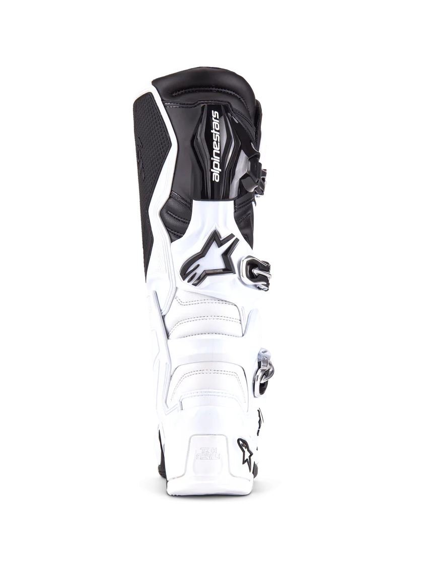 White and black motorcycle boot with brand logo on a white background