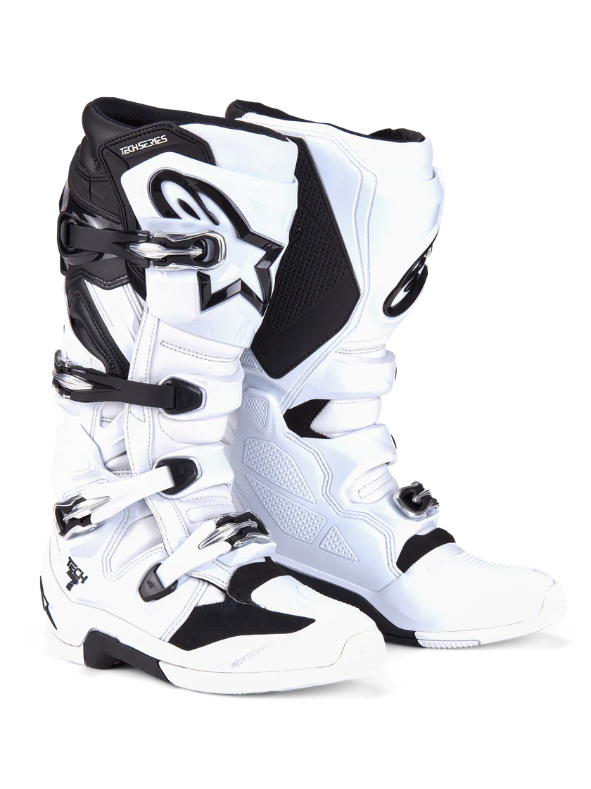 White and black motocross boots on a white background