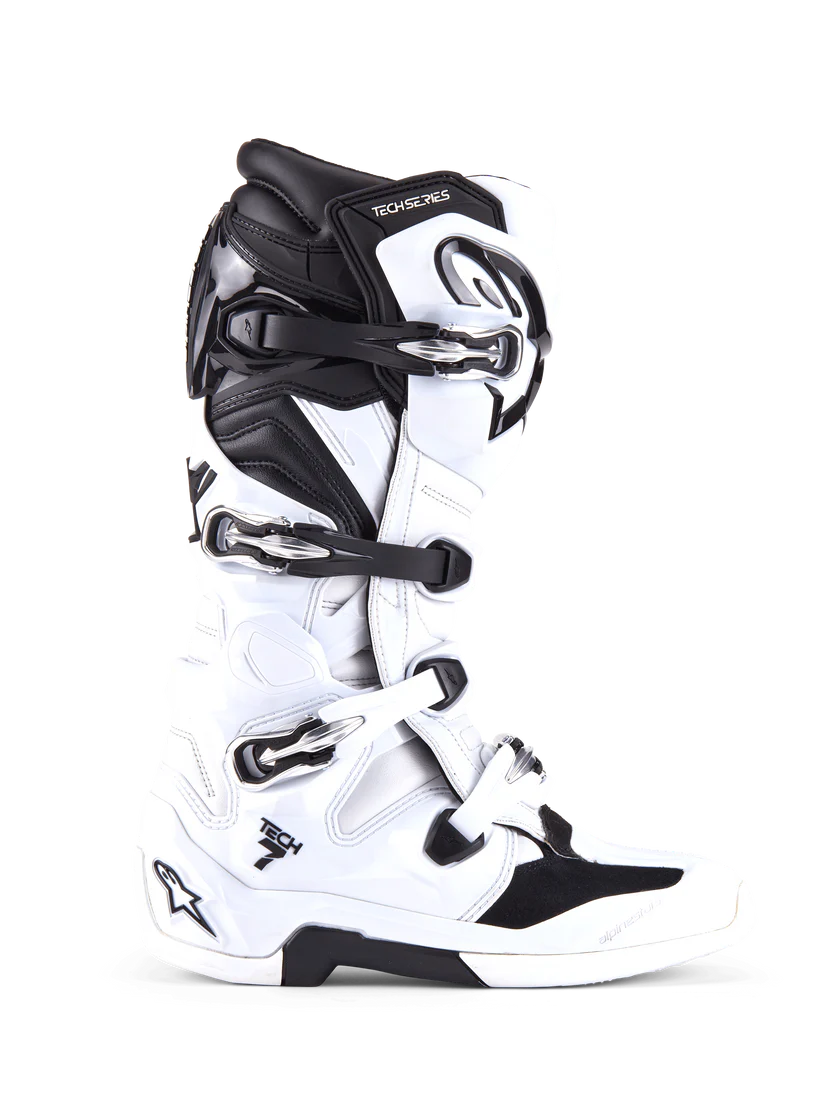 White and black motocross boot on a white background