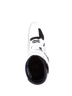 White motocross boot with black sole on a white background